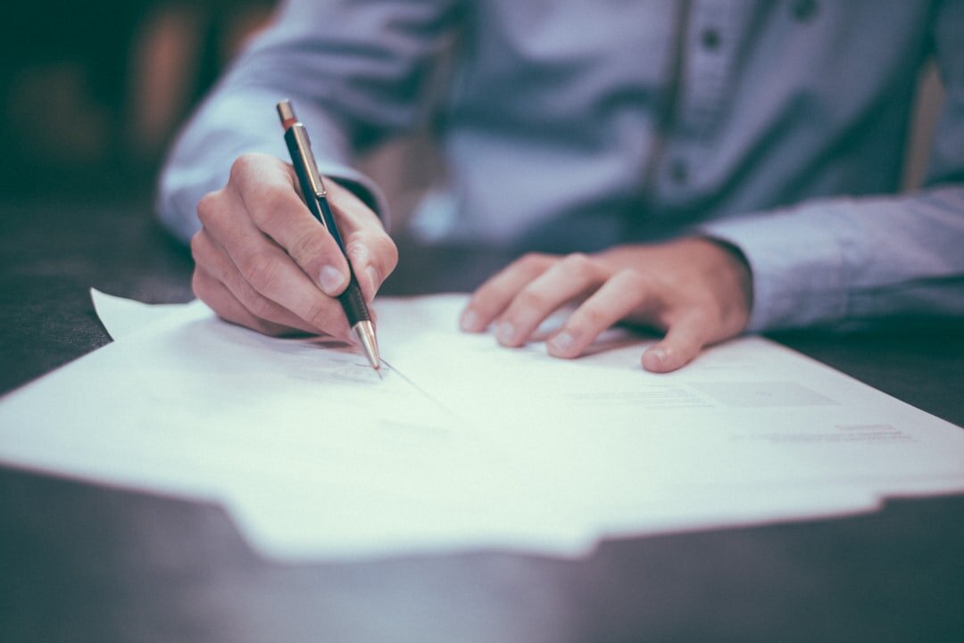 person reviewing insurance papers