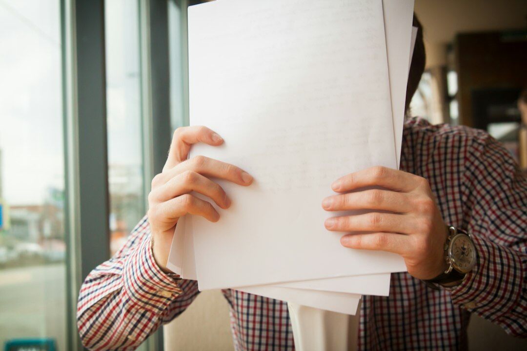 person reviewing documents